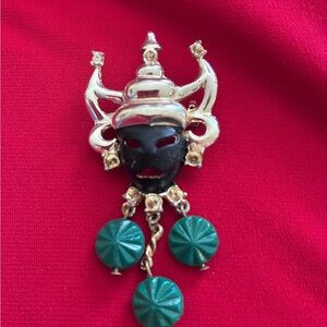 Elegant Gold and Black Mask Pendant